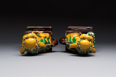 A pair of Chinese sancai-glazed Buddhist lions, Kangxi mark, 19th C.