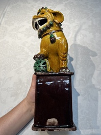 A pair of Chinese sancai-glazed Buddhist lions, Kangxi mark, 19th C.