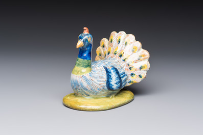 A polychrome Dutch Delft 'Peacock' cover, 18th C.