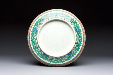 A fine Chinese famille rose pale celadon-ground 'phoenixes' dish with a reticulated rim, Qianlong