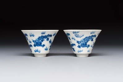 A pair of Chinese blue and white 'Bleu de Hue' 'Dragon' cups, Nhuoc Tham Tran Tang 若深珍藏 mark, 19th C.