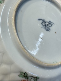 Seven Chinese famille verte cups and four saucers, conch shell and lingzhi marks, Kangxi