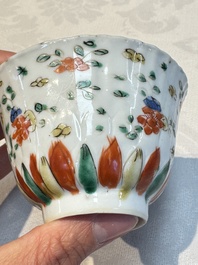 Seven Chinese famille verte cups and four saucers, conch shell and lingzhi marks, Kangxi