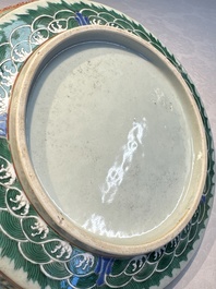 A fine Chinese famille rose pale celadon-ground 'phoenixes' dish with a reticulated rim, Qianlong