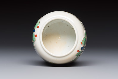 A Chinese famille verte 'Butterflies' water pot with relief design, Kangxi