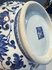 A Chinese blue and white 'Yuhuchunping' vase with lotus scroll design, Qianlong mark and of the period