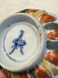 Seven Chinese famille verte cups and four saucers, conch shell and lingzhi marks, Kangxi