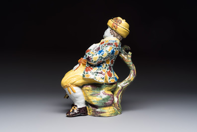 A polychrome Dutch Delft 'Bobbejak' table fountain and cover, 18th C.