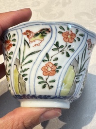 Seven Chinese famille verte cups and four saucers, conch shell and lingzhi marks, Kangxi