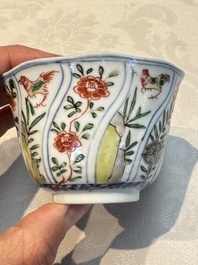 Seven Chinese famille verte cups and four saucers, conch shell and lingzhi marks, Kangxi