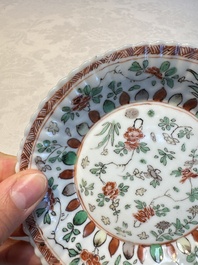 Seven Chinese famille verte cups and four saucers, conch shell and lingzhi marks, Kangxi