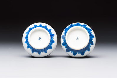 A Chinese blue and white covered vase and two bottle vases, Chenghua and jade marks, Kangxi