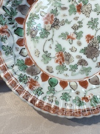 Seven Chinese famille verte cups and four saucers, conch shell and lingzhi marks, Kangxi