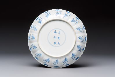 A Chinese blue and white 'Elegant Ladies Making Music' plate, Chenghua mark, Kangxi