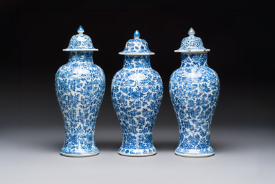 A Chinese blue and white five-piece garniture with floral design, Kangxi