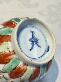 Seven Chinese famille verte cups and four saucers, conch shell and lingzhi marks, Kangxi