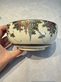 A Japanese Satsuma bowl, a pair of vases, a polychrome figure, and a marked Koransha bowl, 19/20th C.