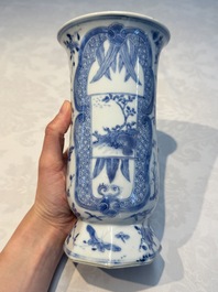 A rare Chinese blue and white five-piece garniture in Dutch Delft style, Kangxi mark, 19th C.
