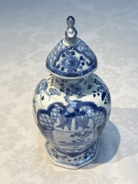 A rare Chinese blue and white five-piece garniture in Dutch Delft style, Kangxi mark, 19th C.