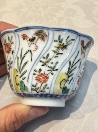 Seven Chinese famille verte cups and four saucers, conch shell and lingzhi marks, Kangxi