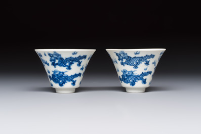 A pair of Chinese blue and white 'Bleu de Hue' 'Dragon' cups, Nhuoc Tham Tran Tang 若深珍藏 mark, 19th C.