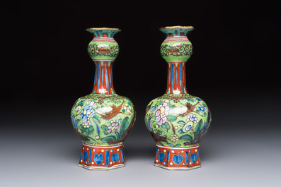 A pair of clobbered Dutch Delft vases, 17th C.