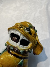 A pair of Chinese sancai-glazed Buddhist lions, Kangxi mark, 19th C.