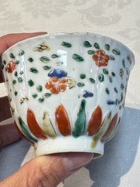 Seven Chinese famille verte cups and four saucers, conch shell and lingzhi marks, Kangxi