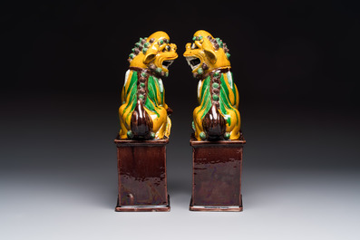 A pair of Chinese sancai-glazed Buddhist lions, Kangxi mark, 19th C.