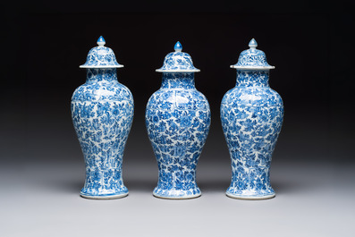 A Chinese blue and white five-piece garniture with floral design, Kangxi