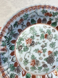 Seven Chinese famille verte cups and four saucers, conch shell and lingzhi marks, Kangxi