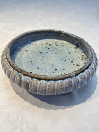 A Chinese Jun-type flamb&eacute;-glazed tripod censer and a Junyao blue-glazed bowl, 19/20th C.