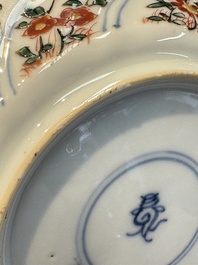 Seven Chinese famille verte cups and four saucers, conch shell and lingzhi marks, Kangxi