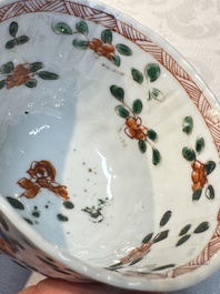 Seven Chinese famille verte cups and four saucers, conch shell and lingzhi marks, Kangxi