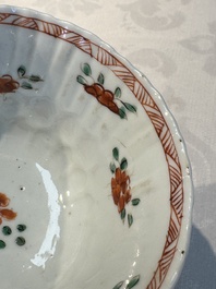 Seven Chinese famille verte cups and four saucers, conch shell and lingzhi marks, Kangxi