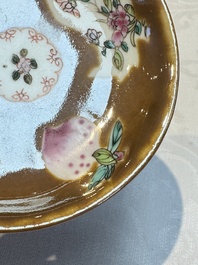 A Chinese famille verte teapot and three famille rose capucine-ground cups and saucers, Kangxi/Qianlong
