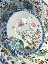 Seven Chinese famille verte cups and four saucers, conch shell and lingzhi marks, Kangxi