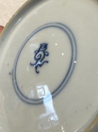 Seven Chinese famille verte cups and four saucers, conch shell and lingzhi marks, Kangxi