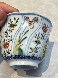 Seven Chinese famille verte cups and four saucers, conch shell and lingzhi marks, Kangxi