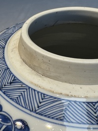 A Chinese blue and white 'Antiquities and Flower Baskets' vase with a wooden cover, Kangxi