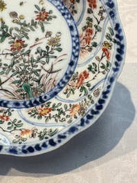 Seven Chinese famille verte cups and four saucers, conch shell and lingzhi marks, Kangxi