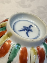 Seven Chinese famille verte cups and four saucers, conch shell and lingzhi marks, Kangxi