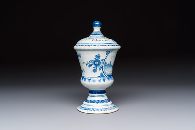 A blue and white inscribed Dutch Delft children's money bank, dated 1786