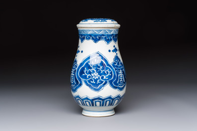 A Chinese blue and white covered vase and two bottle vases, Chenghua and jade marks, Kangxi