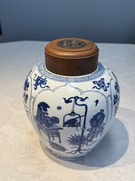 A Chinese blue and white 'Antiquities and Flower Baskets' vase with a wooden cover, Kangxi
