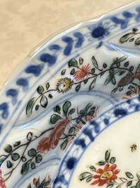 Seven Chinese famille verte cups and four saucers, conch shell and lingzhi marks, Kangxi