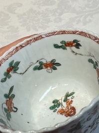 Seven Chinese famille verte cups and four saucers, conch shell and lingzhi marks, Kangxi