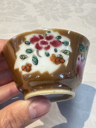 A Chinese famille verte teapot and three famille rose capucine-ground cups and saucers, Kangxi/Qianlong