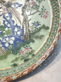 A fine Chinese famille rose pale celadon-ground 'phoenixes' dish with a reticulated rim, Qianlong