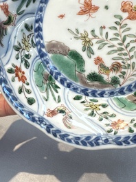 Seven Chinese famille verte cups and four saucers, conch shell and lingzhi marks, Kangxi